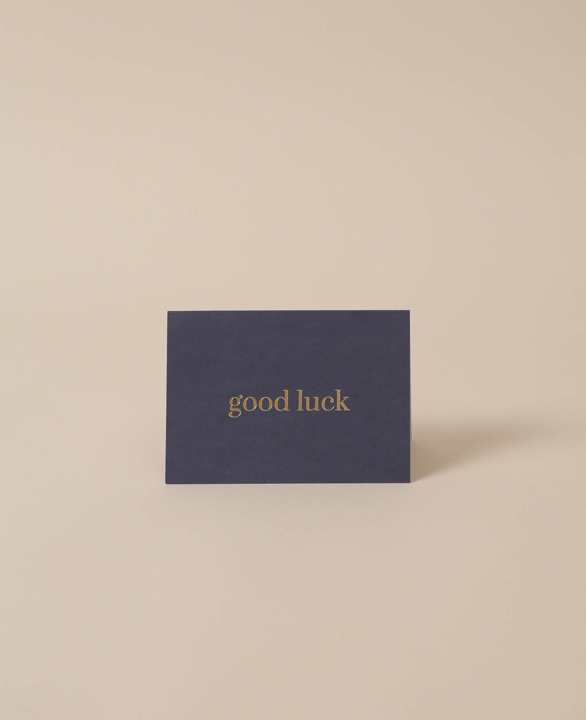 Dark blue folded card, good luck