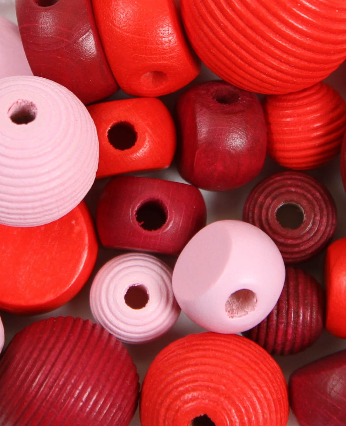 Mélange de perles en bois, hêtre, tons rouges, 10-20 mm, trou env. 3 mm, env. 28 g