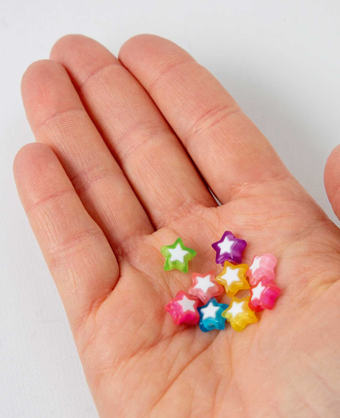 Schmuckperlen – Sterne bunt, 8x7 mm, 50 Stk., Kunststoff