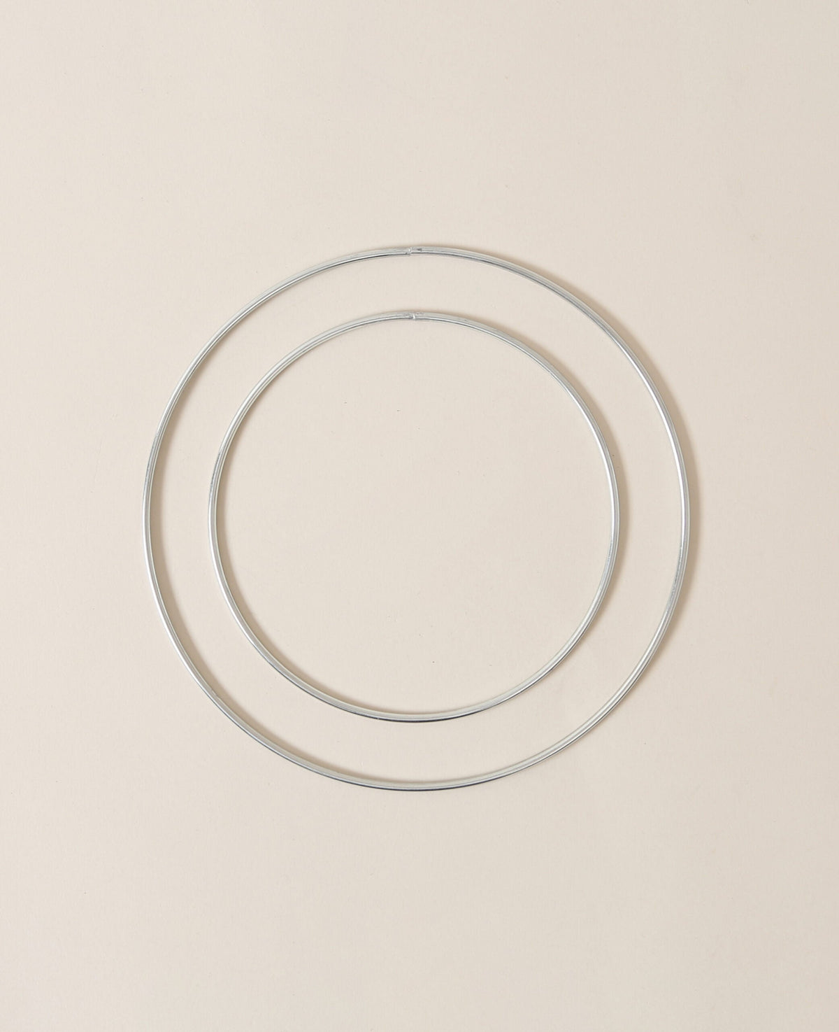 Metal rings in silver, 20 & 15 cm, 3.5 mm thick