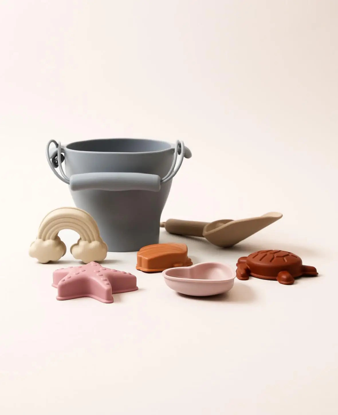 Sandspielzeug Set für Kinder, aus Silikon in Blau/Beige/Rosa, mit Kessel, Schaufel und Formen