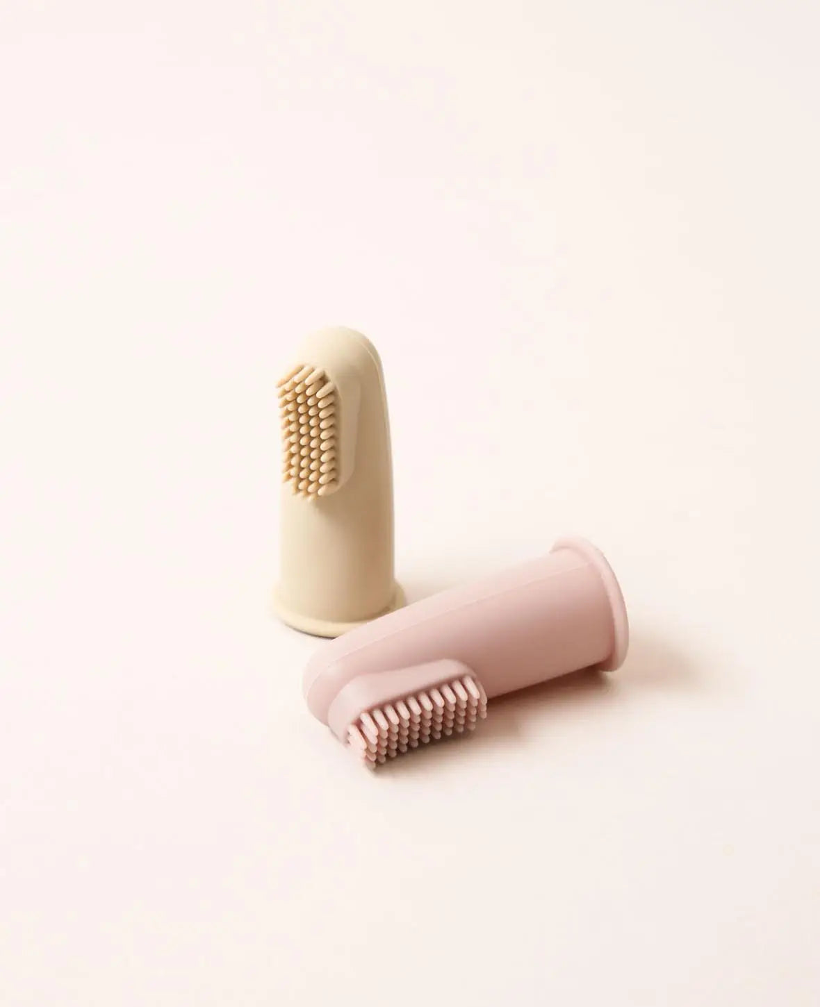 2er Set Fingerzahnbürste für Babys, aus Silikon in Rosa und Beige