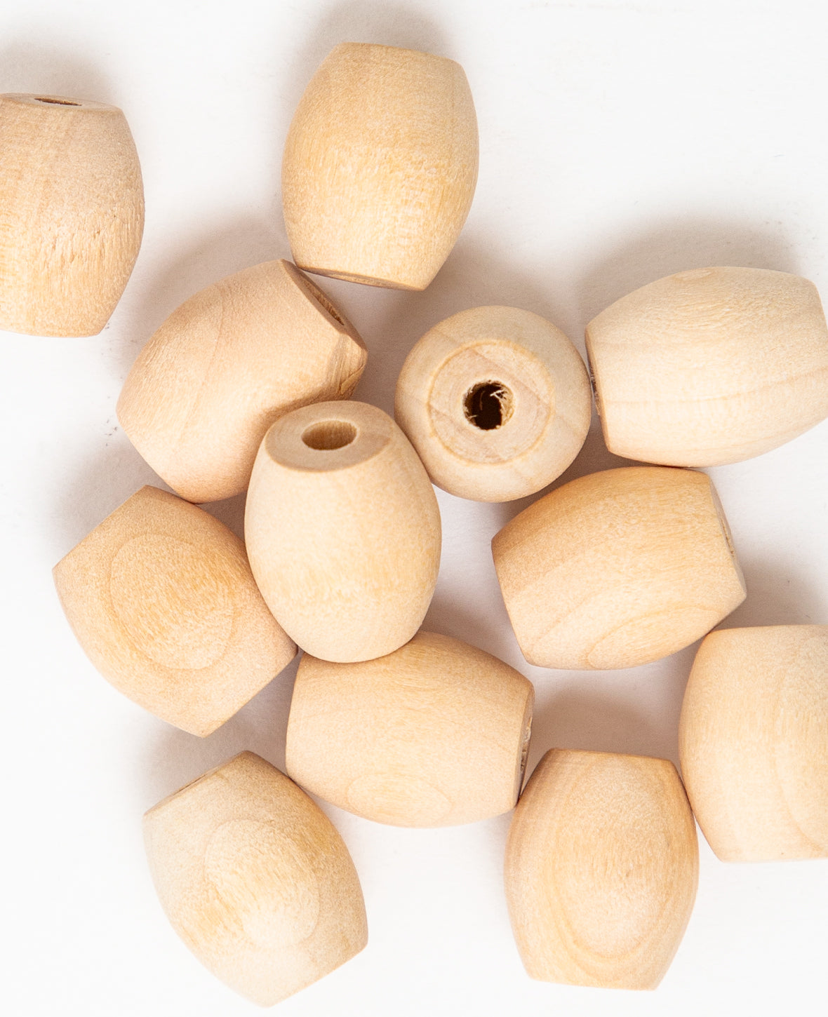 Oval wooden beads, ø 17 x 20 mm, brown, 12 pcs.